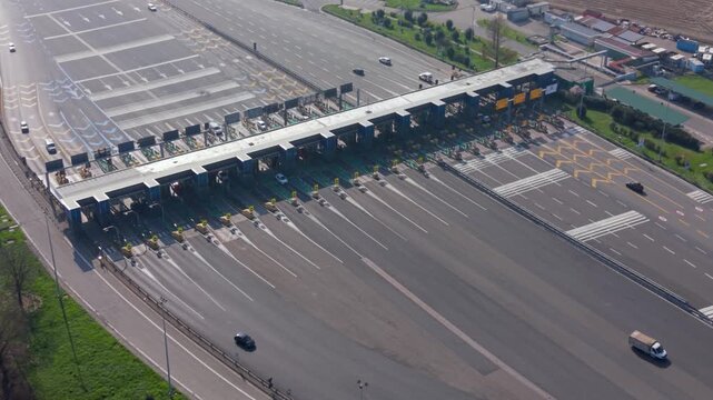 Motorway toll plaza aerial traffic infrastructure northern Italy