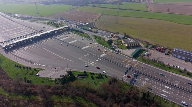 Toll plaza highway traffic aerial view northern Italy motorway