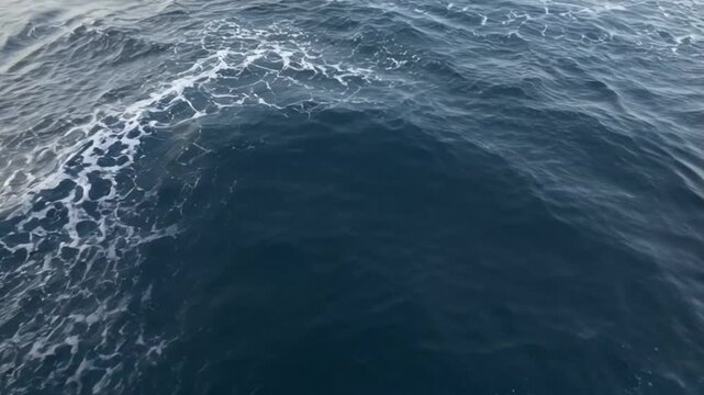 Aerial view of a frozen lake with ice formations and textured surface