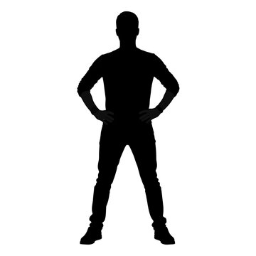 Silhouette of a person standing confidently with hands on hips
