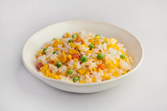Egg fried rice with vegetables in a bowl