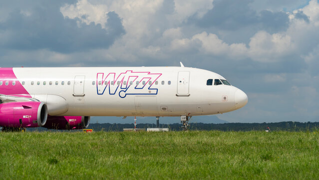 Wizzair Airbus A321 is taxiing at MXP Milano Malpensa international airport