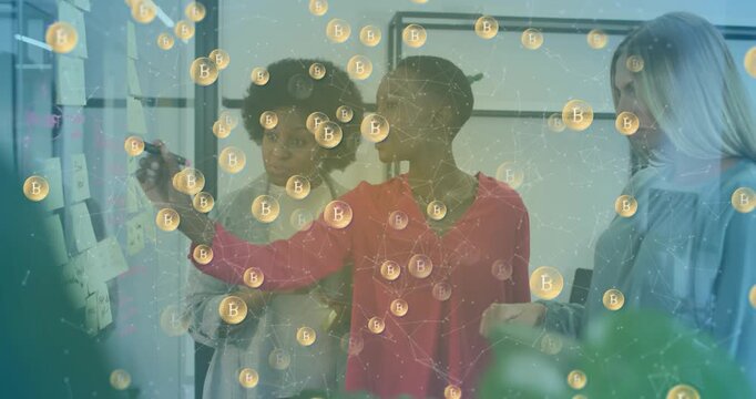 Animation of bitcoin symbols over diverse business people having meeting at office