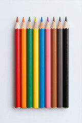 Fototapeta premium Vibrant Set of Colored Pencils Arranged in a Neat Row on White Background Perfect for Creative Arts Education and Design Projects