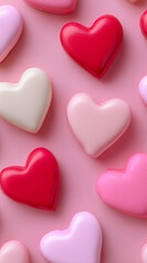 Fototapeta premium Colorful heart-shaped candies arranged together symbolizing love, romance and Valentine’s Day.