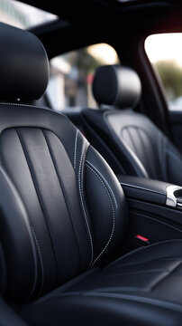 Modern luxury black leather car seats inside premium vehicle interior representing comfort and automotive design.