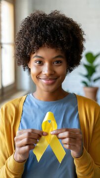 Yellow ribbon held by black woman symbolizing endometriosis awareness, chronic pain advocacy, hormonal health education, women's health empowerment, awareness campaign, support and solidarity