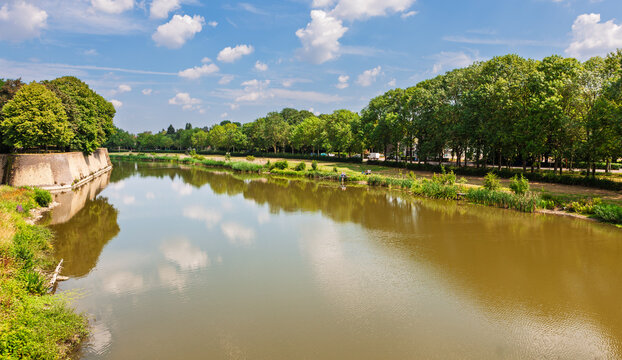 Still and clear moat around the historic town of Ieper (Ypres), Belgium. 