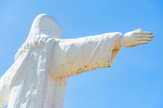 View with the majestic Cristo Blanco Statue ((White Christ)) atop Pukamuqu Hill in Cusco.