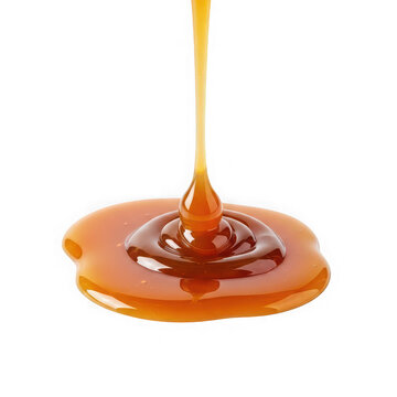 Golden caramel sauce pouring and splashing isolated on transparent background