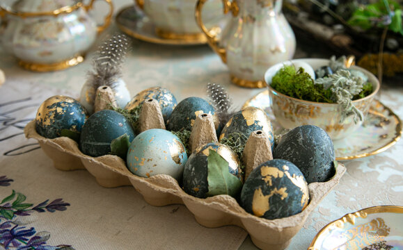 Painted Easter eggs are on a served table, spring photo, Easter holiday concept. 