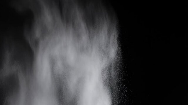Dust white chalk explosion high contrast black background motion powder cloud, fine particles scattering and swirling in air.