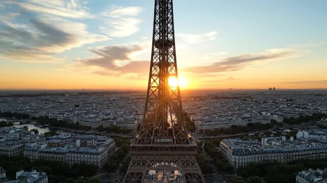 Eiffel Tower video captures sunset over Paris cityscape with iron lattice structure
