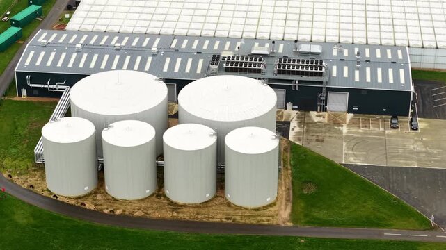 Drone shot of a biogas energy hub and horticultural plant near Cambridge, capturing the scale of modern UK agri-tech.