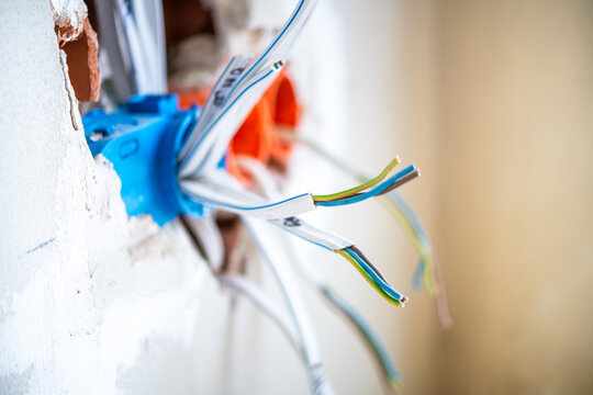 Closeup of electrical wiring installation in building wall