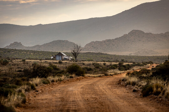 Rural Dirt Road and House
