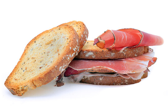 fette biscottate con speck