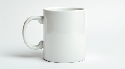 Fototapeta premium Plain White Ceramic Coffee Mug with a Smooth Finish Ideal for Personalization or Everyday Use in Any Setting