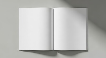 Fototapeta premium Open blank spread book flat lay on muted gray background, mockup design concept
