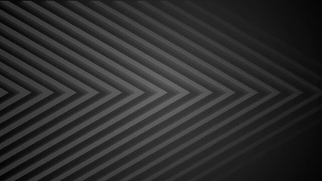 Dark abstract background with repeating chevron arrows formed by layered diagonal lines converging animation