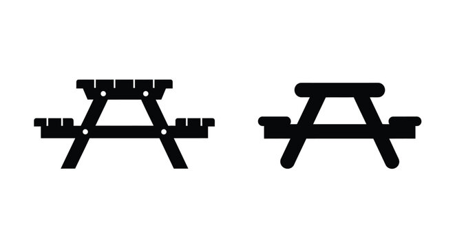 Two black picnic tables are shown in a minimalist silhouette