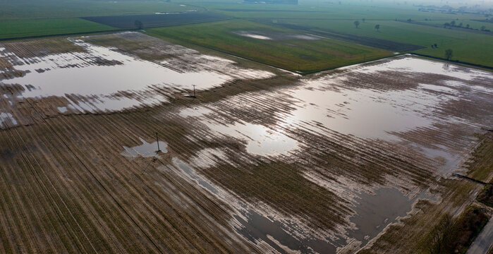 panoramic aerial view of farmland and flooded fields due to heavy rainfall