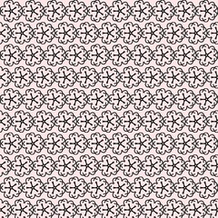 Seamless Floral Pattern with Hand-Drawn Black Blossoms on Pink Background