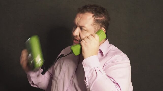 A funny businessman poses in the studio