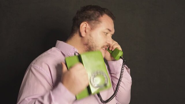 A funny businessman poses in the studio