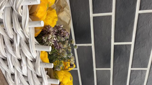 decorate the cafe wall with pumpkins and flowers in a basket