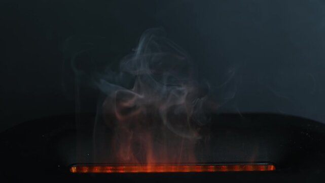 A column of ethereal blue fire or magical smoke rises and swirls on a black background. Seamlessly looping animation perfect for fantasy, Halloween, or as a supernatural effect