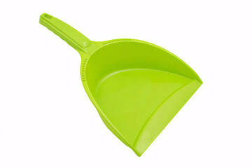 Bright green plastic dustpan with a handle, used for sweeping up dirt and debris, isolated on a white background.