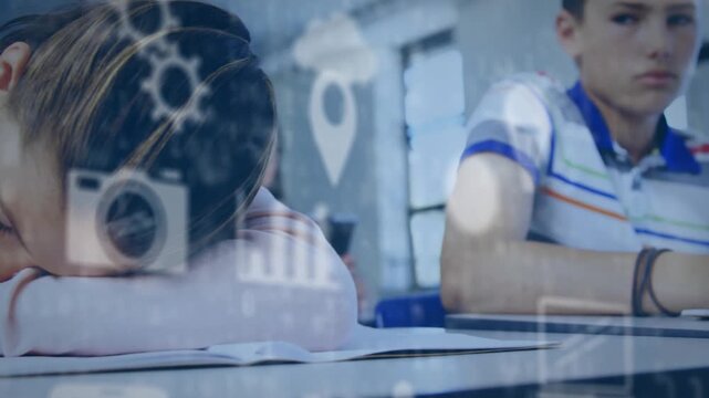 Tablet activating HUD gears WiFi charts while front girl resting head and boy writing during class