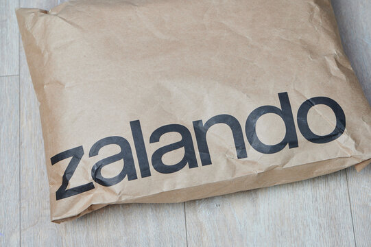 Mainz, Germany - March 04, 2026: Zalando package on a wooden background