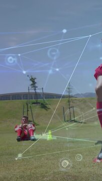 Vertical video: Player entering right doing hops past cones as seated doing core HUD tracking drill