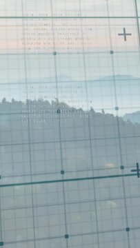 Vertical video: Camera shifting, grid staying on glass, text clarifying tech metrics over hills