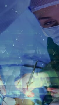 Vertical video: Surgeon reacting to asst handing tool, using on incision in OR, overlay aiding fix