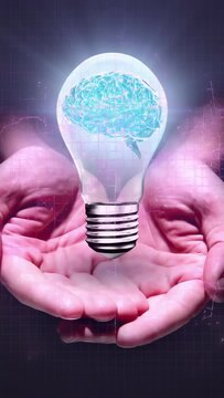 Vertical video: Dark frame shifting, cupped hands steady as glowing brain bulb rising showing tech