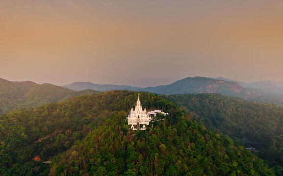 White pagoda Loha Prasat Sri Mueang Pong temple in Chiang Mai, Thailand Aerial view