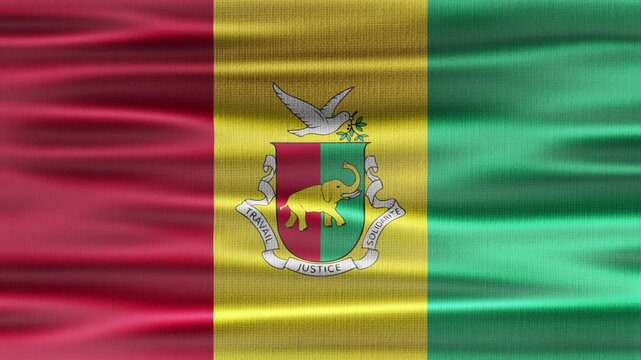 Guinea flag waving in the wind with high quality fabric texture