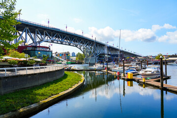 False Creek Yacht Club in front of Granville Street Bridge, a steel truss bridge in Vancouver, British Columbia, Canada © Alexandre ROSA