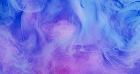 Naklejka premium Paint cloud. Ink drop splash. Defocused pink blue color spreading vapor fume glitter underwater fog acrylic liquid on abstract background.