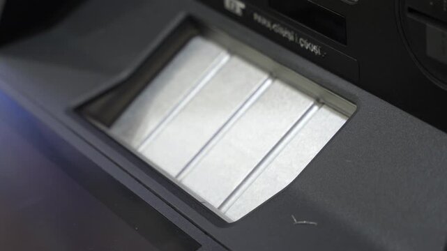 Cash dispensing slot of ATM machine
