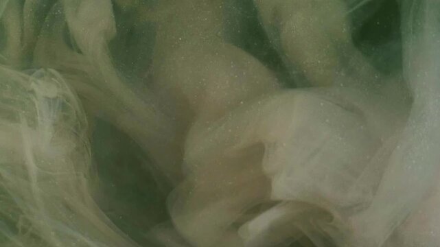 Shimmer twirl. Abstract paint. Defocused pink color ink in chemical water glitter wet smoke splash pigment on creative acrylic art.