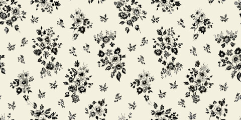 Delicate black floral pattern on a cream colored background texture