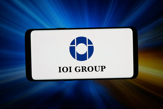 Stuttgart, Germany - 03-04-2026: In this photo illustration, the logo of Malaysian company IOI Corporation Berhad is displayed on a smartphone in front of abstract background on computer screen.