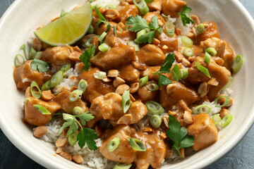 Chicken Satay with rice, roasted peanuts and greens