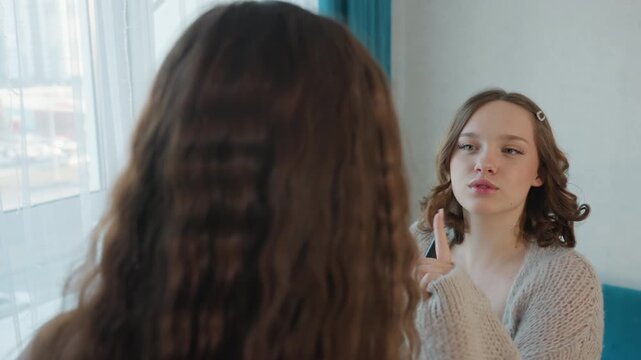 Friend Guides Cosmetics, Woman Discusses Beauty Routines Openly, Brightly Lit Room Features Skincare Dialogue Exchange, Woman Seeks Advice From Friend On Makeup Techniques In Welllit Space