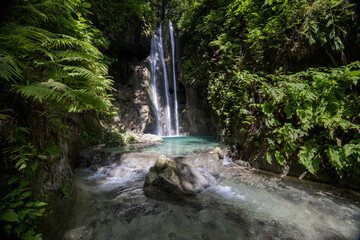 Three-tier cascades of Binalayan aka Hidden falls in the lush, green jungle, Samboan, Cebu, the Philippines © Hodossy