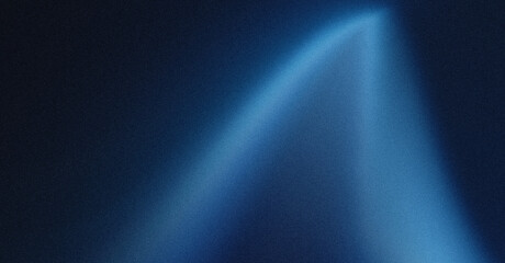 A blue light shines brightly in the dark